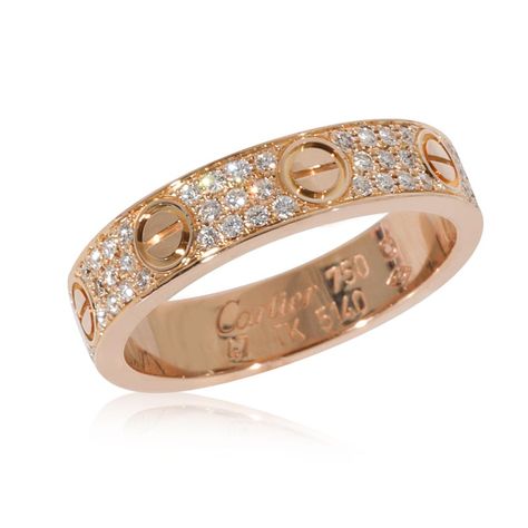 This is part of Chairish’s Fine Jewelry assortment.  Cartier Love Diamond Pave Band in 18k Rose Gold 0.31 CTW  PRIMARY DETAILS  SKU: 127911  Listing Title: Cartier Love Diamond Pave Band in 18k Rose Gold 0.31 CTW  Condition Description: Retails for 7300 USD. In excellent condition and recently polished. Ring size is 4. Comes with Pouch;Certificate of Authenticity;Service Papers;  Brand: Cartier  Collection/Series: Love  Metal Type: Rose Gold  Metal Purity: 18k  Ring Size: 4  Pre-Owned Jewelry Condition: Excellent  SIDE STONE INFORMATION  Side Stone 1 Gem Type: Diamond  Side Stone Weight 1 (cts): 0.31  Side Stone 1 Shape: Round Brilliant  Side Stone 1 Color: DEF  Side Stone 1 Clarity: VS  Original Box?: No  Original Papers?: Yes  This item has been used and may have some minor flaws. Before Cartier Ring Women, Cartier Gold Ring, Cartier Diamond Rings, Cartier Love Collection, Cartier Love Wedding Band, Cartier Collection, Cartier Gold, Clean Jewelry, Pave Diamond Band