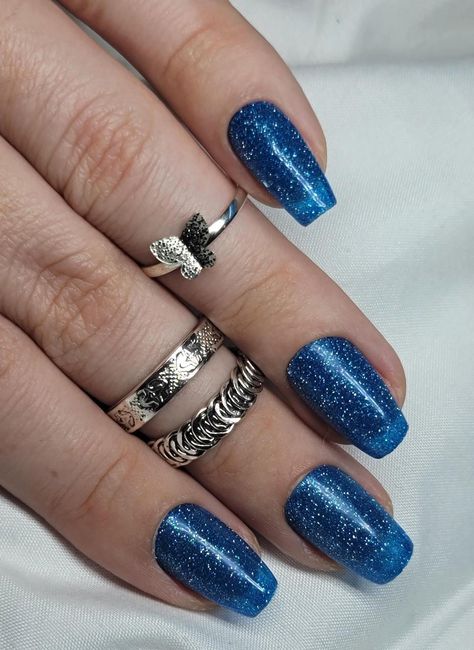 These are hand-painted blue glitter nails with a glossy finish. *Model length and shape: Short Coffin This set comes in 10 or 30 pieces. They are made to order, depending on each customer's specific nail size (if ordering a 10 piece set) and desired nail shape. They are reusable if attached to the nail bed using nail glue (lasting 2 to 3 weeks) or using adhesive nail tabs (lasting 1 to 2 days). They are not reusable if attached using acrylic (lasting 3+ weeks). This set comes with a free nail prep kit, which includes: - Instructions for application - Nail Glue - Adhesive nail tabs - Wooden cuticle pusher - Alcohol prep pads - Mini file If ordering a 10 piece set, please refer to the sizing guide and the shape and length guide in the listing to find your perfect fit! If your measurements do Glitter Blue Nails, Blue Glitter Nails, Short Coffin, Nail Prep, Cuticle Pusher, Adhesive Glue, Nail Sizes, Nail Glue, Blue Glitter