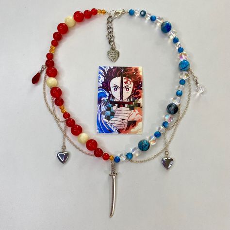 Demon Slayer inspired custom necklace by @craftedbyfairy Demon Slayer Inspired Bracelets, Anime Inspired Beaded Jewelry, Beaded Anime Jewelry, Anime Beaded Jewelry, Demon Slayer Necklace, Demon Slayer Jewelry, Demon Slayer Bracelet, Demon Slayer Accessories, Anime Inspired Jewelry