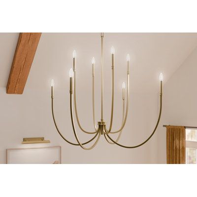 This foyer chandelier is inspired by the graceful movement of rippling water—gentle, flowing, and captivating. These characteristics come to life in its soft, sweeping arms and elegant, stacked details. Includes two different candle sleeves, white for a contrasting, traditional look or black for a modern look. Fixture measures 43.5 inches in height x 45.25 inches in diameter. cETLus Safety Listed for Dry Indoor Locations. Designed for easy cleaning: turn off electric current and wipe with a damp