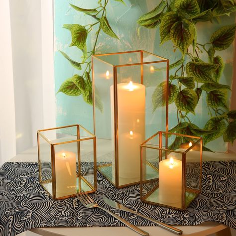 PRICES MAY VARY. ☆Gold Candle Holder Set of 3 Pieces - The Gold glass candle holder include 3 PCS different size, they can meet your different need. Large Size: 11'' x 5.2'' x 5.2'', Medium Size: 5'' x 4'' x4''. ☆Unique Square Candle Holder -Phosphor hurricane candle holder is different form others. Our glass candle holder is square, the outline is clear, the frame is simple and three-dimensional, fashion and a bit of artistic sense is added. ☆Exquisite Workmanship -Our gold hurricane candle hol Small Glass Candle Holders, Square Candle Holders, Square Candles, Electronic Candles, Gold Candle Holders, Gold Candles, Glass Candle Holder, Beautiful Candles, Candle Holder Set