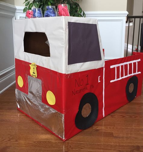 Cardboard box fire truck. I used red wrapping paper for the body, aluminum foil for the chrome and paper plates for wheels. Sirens/lights are clear cups stuffed with tissue paper. My 2.5 year old loves to play in it. He thinks he is a real firefighter Box Fire Truck, Red Wrapping Paper, Boat Ideas, Clear Cups, Old Love, Toddler Learning, Fire Truck, Paper Plate, Sirens