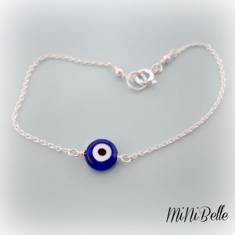 as seen on many this evil eye bracelet I've heard is supposed to bring good luck.... details: Sterling Silver .925 glass evil eye measures 8mm Dainty Chain measures 1mm please select your desired length from top right drop down menu thanks for looking :0) Mens Evil Eye Bracelet, Evil Eye Bracelet For Men, Evil Eye Jewelry Bracelet, Evil Eye Bracelet Silver, Silver Evil Eye Bracelet, Blue Evil Eye Bracelet, Emo Jewelry, Rose Quartz Bracelet Beads, Glass Evil Eye