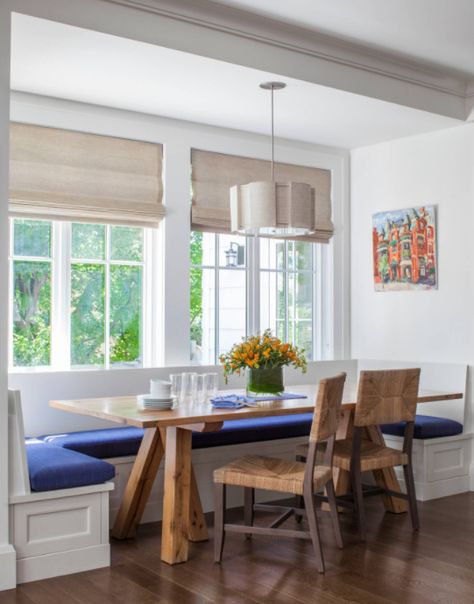 Picture perfect breakfast nook with Flat Roman Shades, pendant light, and rustic oak table. By LDa Architecture & Design, photo by Sean Litchfield Photography. Dining Room Bump Out, Built In Benches, Breakfast Nook Cushions, Blue Dining Room Decor, Modern Breakfast Nook, Breakfast Nook Bench, Nook Bench, Breakfast Nook Table, Diy Roman Shades