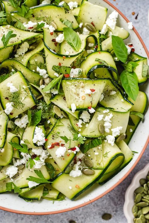 Zucchini ribbon salad in a serving bowl topped with herbs and feta cheese. Zucchini Ribbon Salad, Herbed Potato Salad, Ribbon Salad, Healthy Vegetarian Breakfast, Raw Zucchini, Week Meals, Zucchini Ribbons, Pasta Side Dishes, Pasta Sides