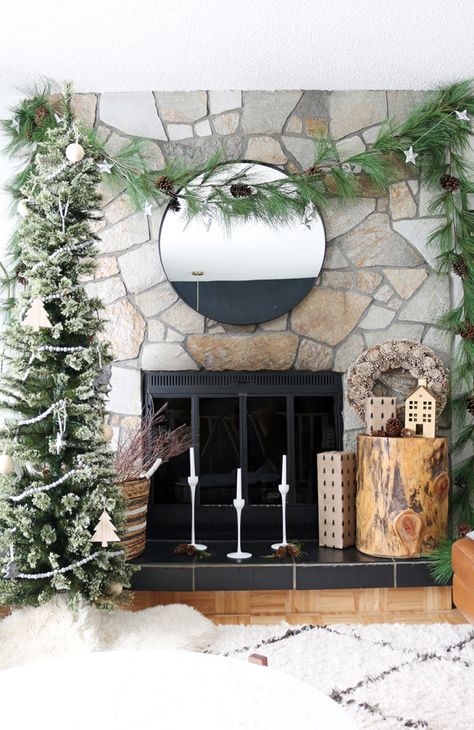 No mantle? No worries! You can still cozy up next to your fresh and inviting fireplace this holiday season with these simple steps. #["Christmas", "How-To", "holiday decor", "scandinavian", "rustic", "decorating", "living room", "accessories", "decor", "featured", "Holiday", "fireplace", "mantle", "inexpensive"] Decorating Fireplace Without Mantel, Fireplace No Mantle Decor, Christmas Fireplace With No Mantle, Christmas Decor Fireplace No Mantel, Christmas Decor Without A Mantle, Fireplace With No Mantle Decor, Christmas Fireplace Without Mantle, Christmas Fireplace No Mantle, Fireplace Without Mantle Christmas