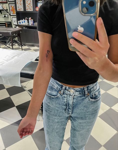 Inner Arm Tattoos For Women Upper, Flower Tattoo Upper Arm, Fine Line Upper Arm Tattoos For Women, Fine Line Flower Tattoo Inner Arm, Female Fine Line Tattoo, Womans Fine Line Tattoo, Fine Line Single Flower Tattoo, Inner Upper Arm Tattoos For Women, Upper Inner Arm Tattoos For Women