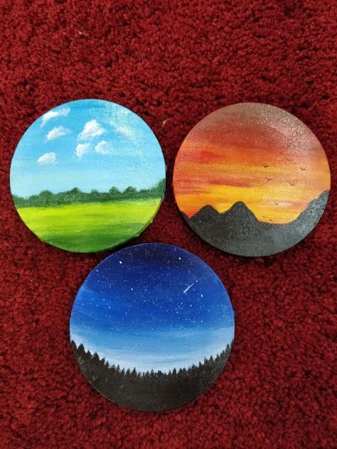 Handmade, set of three, 5 inch diameter circular canvas, acrylic. The set depict various hues and moods of the sky through the eyes of the artist. Rock Painting Acrylic, Art Mini Toile, Wood Paintings, Circular Canvas, Acrylic Art Projects, Art Pierre, Wood Slice Art, Stone Art Painting, Cd Crafts