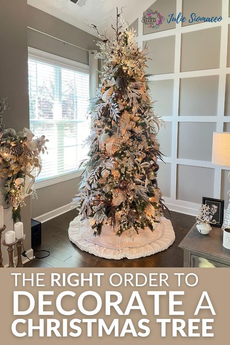 Looking to create a show-stopping Christmas tree this year? Check out our step-by-step guide on the correct order to decorate your tree like a pro! From choosing the perfect tree to adding the final touches with ornaments and ribbon, this guide will help you turn your holiday vision into reality. #ChristmasTreeDecorating #HolidayDecor #ChristmasTreeTips #DIYHolidayDecor Trim A Tree Christmas, How To Decorate A Tree Like A Pro, Christmas Tree With Flowers And Ribbon, Step By Step Tree Decorating, How To Style Christmas Tree, Downswept Christmas Tree Decorated, Layering Ribbon On Christmas Tree, Steps In Decorating A Christmas Tree, Steps To Decorate A Christmas Tree