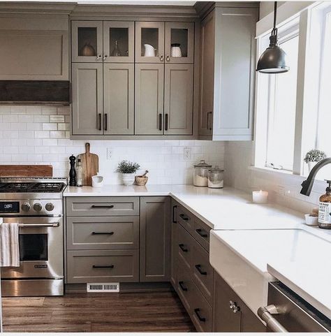 #farmhousehomedecor #rustic #farmhouseideas #farmhouse Taupe Kitchen Cabinets Dark Floors, Modern Farmhouse Painted Cabinets, Taupe Tiles Kitchen, Modern Ranch Style Homes Interior Decor Kitchen, Cozy Kitchen Cabinet Colors, Neutral Kitchen Black Hardware, Grayge Color Kitchen, Kitchen Cabinet Color Ideas Minimalist, Kitchen Schemes Ideas