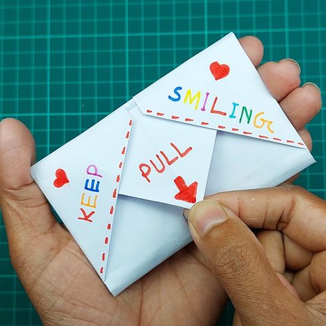 Valentine's Day Paper Gift Card Without Glue or Tape😍 | origami, craft, gift card | Watch how to make a pull tab origami paper gift card for upcoming valentine's day 2022. You can gift this unique craft for your girlfriend or boyfriend.... | By Creative Art & Craft Ideas Origami Gifts For Girlfriend, Pull Tab Cards, Art Craft Ideas, How To Make Letters, Diy Gifts For Girlfriend, Barbara Kruger, S Letter Images, Origami Gifts, Letter Images