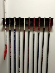 5 Best Hockey Stick Racks & Holders Review 2021 | BestHockeyProducts How To Hang Hockey Sticks On Wall, Hanging Hockey Sticks On Wall, Hockey Stick Rack Diy, Hockey Stick Storage Ideas, Hockey Stick Storage Diy, Hockey Stick Holder Diy, Hockey Stick Organization, Hockey Gear Storage Ideas, Hockey Stick Rack