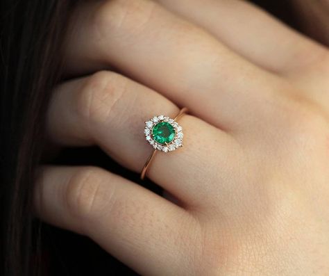 Green Wedding Ring With Single Diamond, Rose Gold Emerald Ring With Brilliant Cut, Round Cut Emerald Ring For Proposal, Rose Gold Solitaire Emerald Ring, Rose Gold Emerald Ring With Prong Setting, Diamond Emerald Ring For Proposal, Elegant Round Emerald Ring With Single Diamond, Half Carat Diamond Ring, Halo Diamond Ring Round