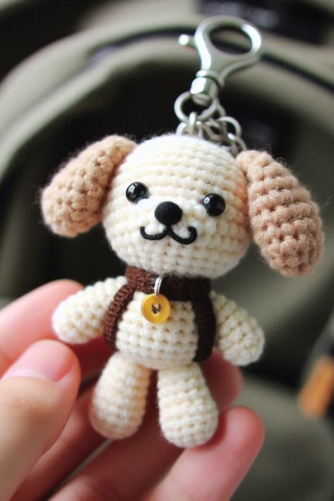 Learn to crochet a cute puppy keychain amigurumi with this beginner-friendly pattern using basic stitches. Crochet Puppy Keychain, Crochet Puppy Pattern Free, Dog Crochet Patterns Free, Crochet Dog Keychain, Knitting Patterns Free Dog, Crochet Puppy, Keychain Amigurumi, Amigurumi Keychain, Dog Patterns