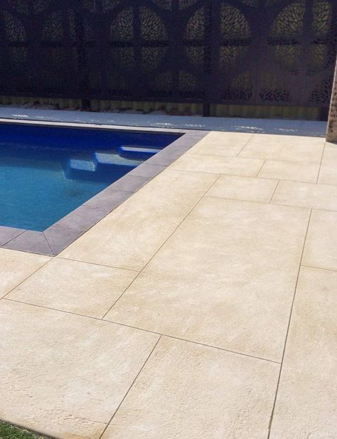 That is the type of limestone I want around my new pool I am getting built. It is a simple stone and I really like the color of it. The simpleness of it works well with the rest of my home. Liquid Limestone Around Pool, Liquid Limestone Patio, Patio Materials, Limestone Pool, Balcony Tiles, Pool Paving, Inground Pool Landscaping, Pool Pavers, Outdoor Tile