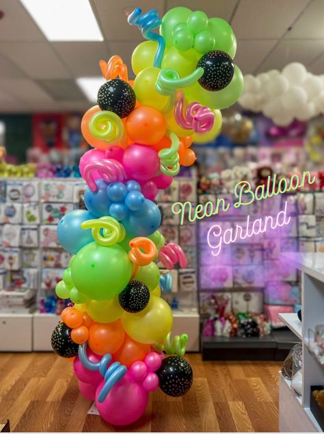 Neon balloon garland  comes in 5in,11in, 18in Neon colors  Comes with Latex printed balloons and a  mix of balloons and 260 balloons   The 260 balloons (long balloons)   come in different neon colors. * Balloons glow in dark  * Outside/ Inside use  ** We recommend our electric pump to blow our balloons, we also recommend the hand pump to make Balloon  swirls* 4ft Balloon Garland  7ft Balloon Garland  9ft Balloon Garland ( the height is like photo)  12ft Balloon Garland Neon Ballons Decoration, Dark Balloon Garland, Colors Theme Party, Neon Balloon Garland, Neon Balloon Arch, 260 Balloons, Neon Balloons, Cheers Theme, Garland Party Decor