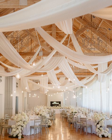 Couple: Hannah & Sam⁠ ⁠ 📍Franschhoek, South Africa⁠ ⁠ What we love about this wedding:⁠ the luxury farm venue with jaw-dropping views of the Cape Winelands, the dreamy all-white ceremony, the “ring for their drink” seating chart, and the reception tablescape covered with cascading white hydrangeas ⁠ Who made it happen? #junebugvendor @chrisel_mouton_photography along with these exceptional wedding vendors:⁠ ⁠ Photography – @chrisel_mouton_photography⁠ Event Planning – @warrenstoneweddings⁠ V... Drink Seating Chart, White Ceremony, Luxury Farm, Beaded Headpiece, Reception Tablescapes, White Hydrangeas, 2025 Wedding, Outdoor Chandelier, Wedding Planning Tools