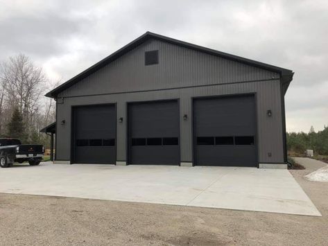 Black Out Buildings, 3 Garage Door Shop, Grey And Black Metal Building, Two Tone Metal Building, Black Metal Garage Buildings, Pole Shed Ideas, 60x80 Shop, Metal Shop Building 40x60, Black Metal Garage