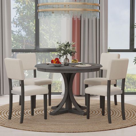 PRICES MAY VARY. Retro-style: With the unique design of graceful curves on table legs and equipped with beautiful cross-based legs, this practical pedestal-style dining set having a timeless quality will be a finishing touch to your restaurant. It will enhance the charm of your dining room with the classic retro approach. Available in two well-combined colors, this dining set reflects a variety of design aesthetics and can bring a retro romantic atmosphere to your restaurant, kitchen area, or fa Small Dinette Sets, Small Round Dining Table, Round Dining Table Set, Round Dining Tables, Round Dining Table Sets, Chairs Kitchen, Dinning Room Design, Dinette Sets, Grey Table