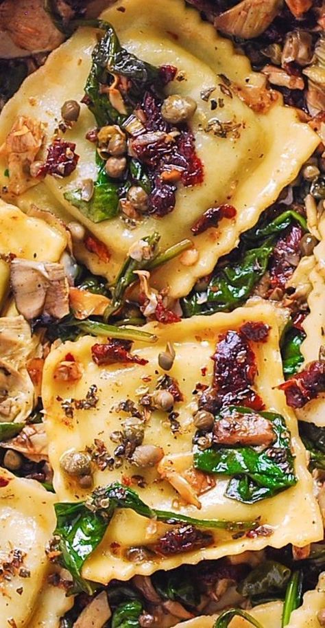 close-up of Italian Ravioli with Spinach, Artichokes, Capers, Sun-Dried Tomatoes Italian Ravioli With Spinach Artichokes, Italian Ravioli, Ravioli With Spinach, Makanan Italia, Resep Pasta, Ravioli Recipe, Resep Diet, Pasta Dinner Recipes, Daily Recipes