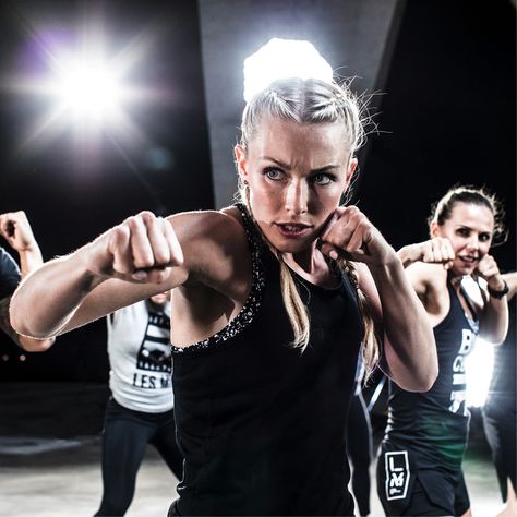 Get fighting fit with BODYCOMBAT, a martial arts-inspired workout featuring boxing, taekwondo, kung fu and more - Find a class or work out On Demand. Tae Bo, London 2022, Body Combat, Fitness Event, Les Mills, Body Pump, Group Fitness Classes, Martial Arts Workout, Group Fitness