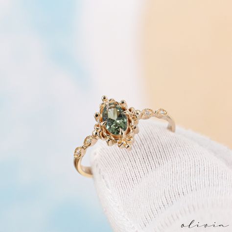 Discover the timeless allure of our Vintage Green Sapphire Engagement Ring, a true embodiment of elegance and vintage charm. Crafted in exquisite 14K and 18k options rose, white, yellow gold, this dainty piece features a brilliant green sapphire, resonating with September's birthstone. Adorned with diamonds and showcasing vintage style, this fine estate ring is designed for a woman seeking both sophistication and a touch of nostalgia. F E A T U R E S 💎 D I A M O N D Carat: 0.03 Quality: VS1 Col Gold Vintage Rings, Vintage Splendor, Green Wedding Rings, Green Engagement Rings, Art Deco Rings, Art Deco Sapphire Ring, Deco Rings, Rings Dainty, Pretty Engagement Rings