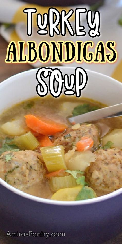 A blue cup of soup with turkey meatballs and veggies with spoon. With Pinterest overlay. Turkey Albondigas Soup, Meatball Soup Healthy, Albondigas Recipe, Albondigas Soup Recipe Mexican, Albondigas Soup Recipe, Turkey Meatball Soup, Ground Turkey Soup, Ground Turkey Meatballs, Albondigas Soup