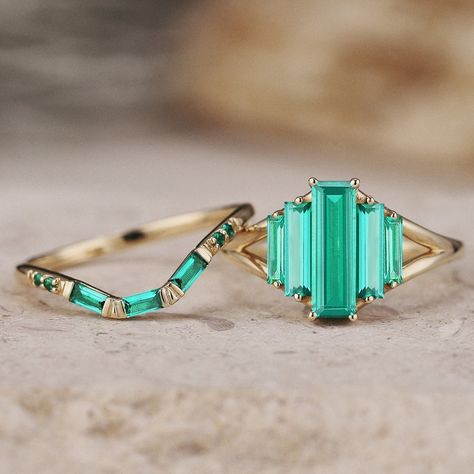 Link to Moissanite Bridal Set: https://www.etsy.com/listing/1567940287/ Unique Emerald Engagement Ring Set Art Deco Gold Rings Baguette cut Emerald Bridal Set Vintage Ring Minimalist Anniversary Gifts For Her ITEM DETAILS ●Available in yellow, white or rose solid 10k, 14k or 18k gold. This ring can be made in Platinum, Sterling silver, Gold plated. ❀❀Center Stone: Lab emerald Shape: Baguette shape Size: 3x10mm & 2x7mm & 1.5x5mm Band width: Around 1.8mm ❀❀Wedding band Stones: Lab emerald Shape: B Emerald Art Deco Ring, Punk Wizard, Emerald Green Engagement Ring, Art Deco Engagement Ring Emerald, Antique Emerald Engagement Ring, Art Deco Engagement Ring Vintage, Vintage Emerald Engagement Ring, Art Deco Rings, Emerald Engagement Ring Set