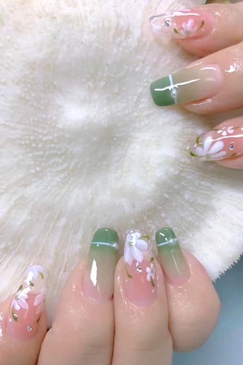 A close-up of stunning pale pink nails, inviting you to explore a world of enchantment and style by booking an appointment at our salon. Green And Pink Nails Designs, Pink And Green Nails Design, Pink Green Nails, Nail Christmas, Pale Pink Nails, Green Nail Designs, Manicure Tips, Glamorous Nails, Pink Nail Designs