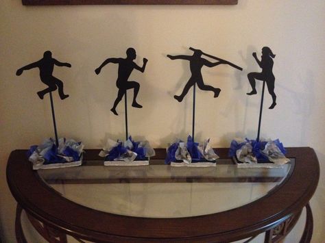 Track banquet centerpieces Track And Field Centerpiece Ideas, Banquet Centerpieces Diy, Track Centerpiece Ideas, Track And Field Party Decorations, Track Banquet Ideas, Track Banquet Centerpieces, Track And Field Banquet Ideas, Track Banquet, Sports Banquet Centerpieces