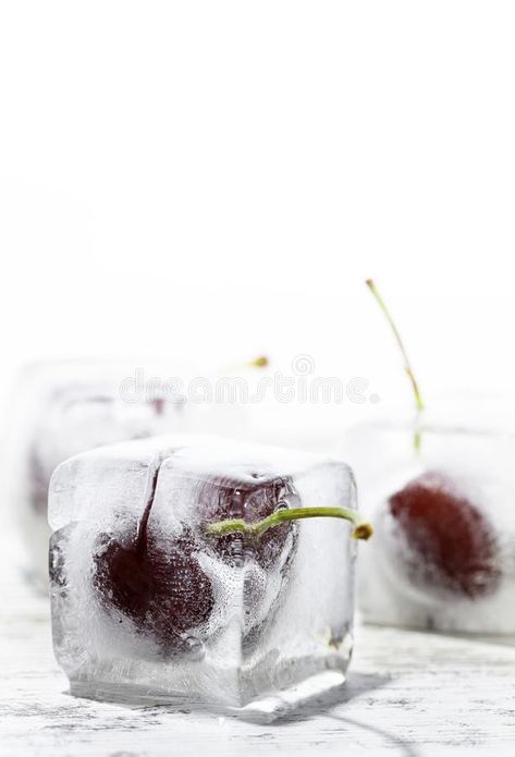 Cherries frozen in cubes. Ice cubes with cherries inside on a wooden table and w , #SPONSORED, #cubes, #Ice, #Cherries, #frozen, #cherries #ad Frozen Cherries, Ice Cubes, Wooden Table, Ice Cube, Wooden Tables, Fashion Women, House Warming, White Background, Photo Image