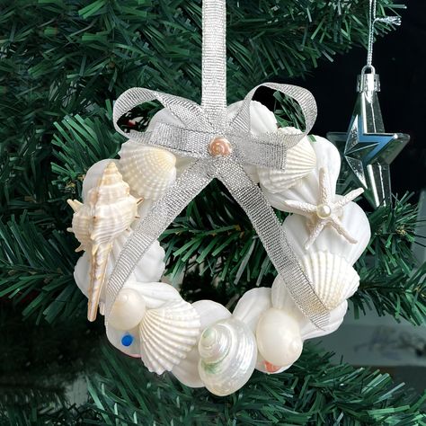 PRICES MAY VARY. Natural Shell Christmas Ornaments: Elevate your Christmas tree with our exquisite handmade ornaments crafted from natural shells. These unique shell crafts will add a touch of elegance and create a distinctive Christmas atmosphere. Easy to Use: Each seashell Christmas tree ornament comes with a ribbon for easy hanging. No tools or complicated installation required. Simply hang them wherever you desire to add a charming coastal touch to your Christmas decorations. Creative Handma Shells Christmas Decorations, Capiz Christmas Ornaments, Clam Shell Christmas Tree, Christmas Seashell Ornaments, Shell Stepping Stones, Sea Shell Ornaments To Make, Sea Shell Christmas Ornament, Seashell Ornaments Diy, Christmas Shell Ornaments