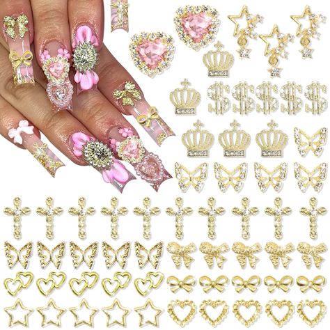 PRICES MAY VARY. Shiny Crystal Design - Our gold star charms for nails are designed from alloy and shiny sparkly crystal, The unique rhinestone design keeps your nails shiny all the time Many Types for Choice - These 3D gold nail charms cross have 12 different shapes about 180pcs,so many shapes and enough quantity for your choice, to fully meet your daily manicure needs Fashion Forward - Gold butterfly nail charms stay ahead of the trends with charms that create to the latest in fashion and nail 3d Charms For Nails, Crown Nails, Cross Nails, Nail Charm, Star Nail, Heart Butterfly, Gold Nail, Gold Money, Dollar Sign