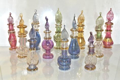 PRICES MAY VARY. Lot of 6 Tiny Mouth Blown Egyptian Perfume Bottles Glass Lot of 6 Tiny Mouth Blown Egyptian Perfume Bottles Glass Egyptian Perfume, Egyptian Perfume Bottles, Handmade Perfume, Wedding Bottles, Essential Oil Perfume, Potion Bottle, Pyrex Glass, Glass Perfume Bottle, Glass Gifts