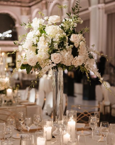 Wedding Centerpieces Ideas Rectangle Table, Wedding Centerpieces High, Candle And Flower Table Decor, Ivory Floral Arrangements, Tall Table Decorations Wedding, White Roses And Candles Centerpieces, White Floral Centerpieces With Candles, Tall Flowers Wedding Table, Tall Candle Centerpieces Wedding Long Table