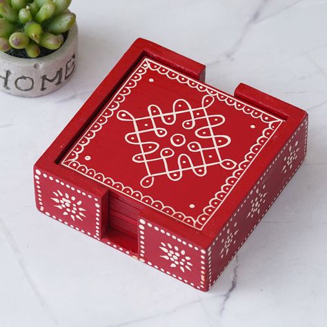 These hand painted wooden tea coasters with Rajasthani designs are a beautiful and functional addition to your home décor. Each coaster is carefully crafted by skilled artisans and features intricate hand painted designs inspired by Rajasthani art. The set includes six coasters, perfect for use with your favorite hot or cold beverages. The wooden material provides durability and protection for your furniture while adding a touch of traditional charm to your living space. Rajasthani Design, Strong Curves, Box Painting, Rajasthani Art, Indian Arts, Box Craft, Unique Centerpieces, Hand Crafts, Wooden Light