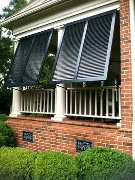 Bahama Shutters - columns - brick (for porch & walkway) - shutters (do in charcoal) Porch Shutters, Bermuda Shutters, Sheer Roller Blinds, Bahama Shutters, Outdoor Shutters, Farmhouse Blinds, Traditional Porch, Patio Blinds, Living Pool