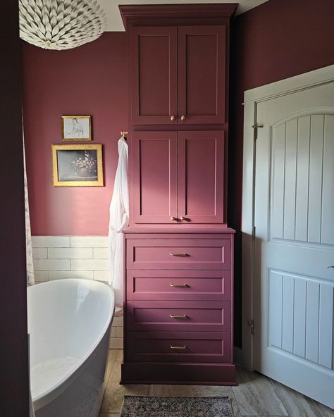 Still can't get over our master bath renovation! . . . . . . . #oneroomchallenge #primarybathroom #bathroomdesign #homerenovations #orcat #moodycolors #whimsical #englishcottage #bathroom Raspberry Bathroom, Mauve Bathroom, Plum Bathroom, Purple Cabinets, Bathroom Cabinet Colors, Porcelain Tub, Master Bath Renovation, Red Cabinets, Cabinets Bathroom