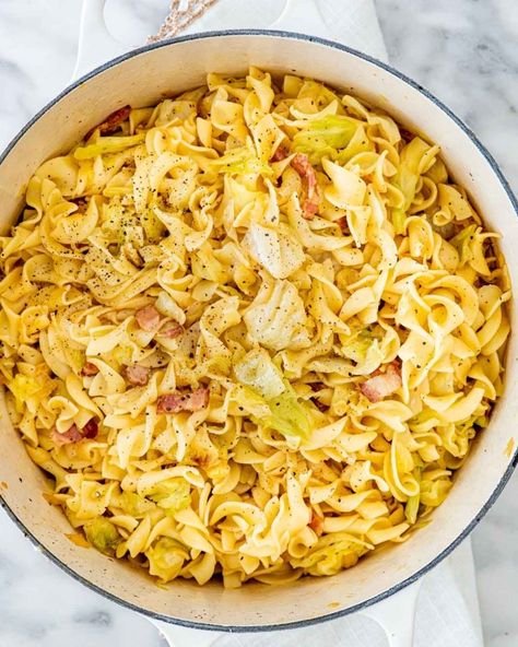 Haluski (Cabbage and Noodles) - This Polish recipe made with egg noodles, bacon, cabbage, and lots of butter is ringing the dinner bell for tonight! Whether you're looking for a simple side or a buttered noodle dish transformed into a full meal, this recipe is the answer. #haluski #cabbageandnoodles #cabbage #noodles #recipe Haluski Fried Cabbage And Noodles, Cabbage And Noodles Recipe, Fried Cabbage And Noodles, Haluski Recipe, Slovak Recipes, Cabbage And Noodles, Cabbage And Bacon, Ukrainian Recipes, Czech Recipes