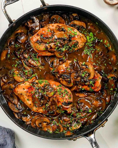 This Chicken Madeira featuring a rich mushroom and wine sauce is made with simple every day ingredients. In under an hour you can have restaurant quality flavor on the dinner table. It's a guaranteed hit to serve guests or a family night in! #chicken #dinner #chickenmadeira #recipe Madeira Food, Chicken Madeira, Jo Cooks, Cooking Chicken, Braised Chicken, Wine Sauce, Chicken Dishes Recipes, Family Night, Recipes Chicken