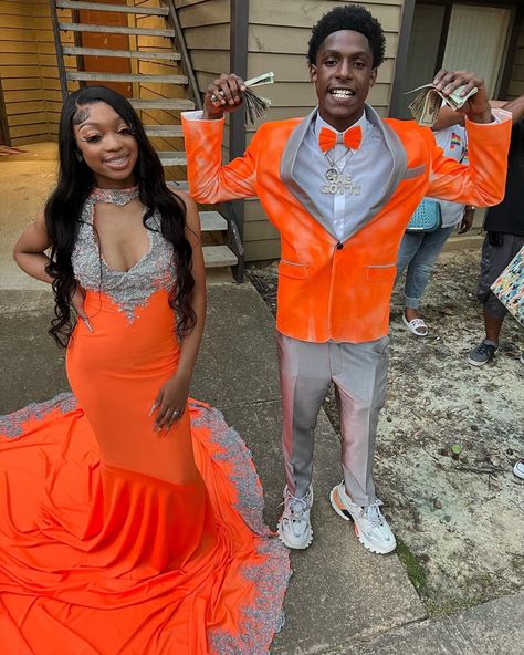 Lime Green Prom Couple, Orange Prom Suits For Black Men, Orange And Grey Prom Couple, Burnt Orange Prom Dress Black Couple, Orange Prom Suit, Orange Prom Couple, Green Prom Couple, Burnt Orange Prom Dress, Cute Prom Couples