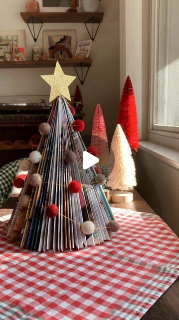 Laura Prietto on Instagram: "How cool that you can turn a single magazine into Christmas tree?! 🌲

10/10 recommend this project! Folding each page is so meditative. Thank you @lightthelights.official for the original inspo ✨✨
.
.
.
#christmascrafts #papercrafts #holidaydecor #christmasdiy #upcycled #sustainablecraft #diychristmastree #magazinechristmastree #fantasyhasreallynolimits #wearethehomemakers #theartofslowliving" Folded Magazine Christmas Tree, Magazine Tree, Magazine Christmas Tree, Christmas Delights, Christmas Origami, Upcycle Decor, Christmas Crafting, Art Medium, Diy Paper Crafts Decoration