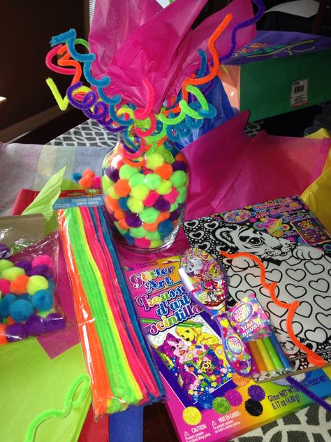 LISA FRANK Centerpiece or decoration!! Ladies/ and gents this here is my creation for a beautiful and very colorful and Fun table centerpiece! You need the following 1. Chenille Stems (cleaning pipes) 2. Pompoms  3. A Vase 4. Tissue paper  **all at the dollar store  Twist the pipes around your pointing finger and pull off !! Lisa Frank Unicorn Birthday Party, Lisa Frank Centerpieces, Lisa Frank Balloon Garland, Lisa Frank Party Decorations, Lisa Frank Birthday, Lisa Frank Party, Lisa Frank Birthday Party, Rainbow Horse, Neon Birthday Party