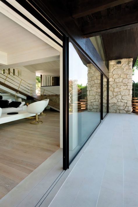 These exterior walls turn residential interiors into open-air dwellings and admit gorgeous views into commercial spaces. Invisible Sill Vitrocsa By bringin Minimalist Window, Sliding Doors Exterior, Modern Sliding Doors, Sliding Glass Doors, Sliding Windows, House Extensions, Residential Interior, Patio Doors, Glass Doors