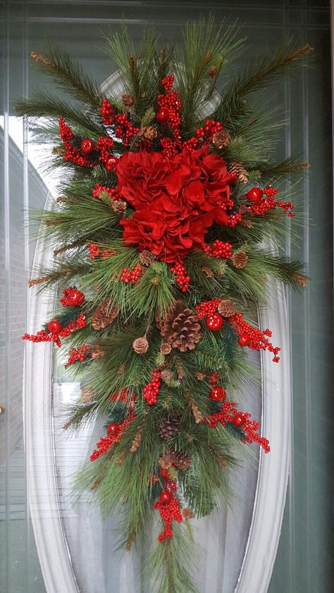 Christmas Wreath - teardrop wreath  red berries; red hydrangea; and pinecones.  Beautiful! Red And White Pine Cone Wreath, Red Pinecone Christmas Wreath, Red Rose Christmas Wreath, Winter Wreath Red, Red Floral Wreath, Red Rose Wreath, Red Hydrangea, Christmas Pine Cones, Rose Wreath