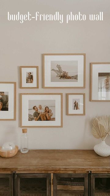 Light Wood Frames On Wall, Small Wall Family Picture Ideas, Natural Wood Gallery Wall, Japandi Picture Frames, Simple Family Photo Display, Light Wood Gallery Wall, Gallery Wall Oak Frames, Wood Frame Photo Wall, Wall Of Photo Frames