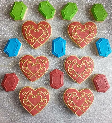 Zelda Cake Pops, Zelda Cookies Decorated, Zelda Botw Birthday Party, Zelda Themed Party, Zelda Snacks, Legend Of Zelda Birthday Party Ideas, Zelda Birthday Party Decorations, Zelda Cookies, Zelda Cupcakes