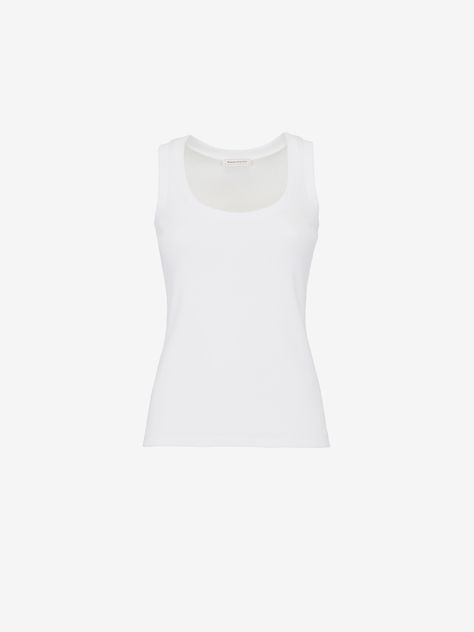 Ribbed tank top in optical white cotton jersey featuring a scoop neck. White Ribbed Tank Top, Iconic Fashion, Ribbed Tank Top, Leather Denim, Scarf Tying, Ribbed Tank Tops, Ribbed Tank, Denim Top, Outerwear Jackets