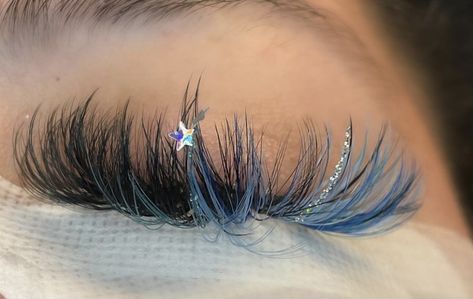 Lash Extensions With Glitter Spikes, Lash Extensions With Color And Glitter, Glitter Eyelashes Extensions, Light Blue Lash Extensions, Lash Extensions Ideas With Color, Mega Volume Lash Extensions With Color, Festival Lash Extensions, Blue Lashes Extensions, Creative Lash Extensions