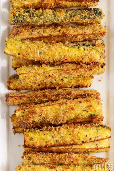 Air fryer zucchini fries are easy to make. This fried zucchini air fryer recipe takes just minutes to make and is a crowd pleaser. Learn how to fry zucchini in an air fryer including our best tips. Air fried zucchini is healthier than deep fried zucchini and takes less time and energy than oven baked zucchini. Dip your fried breaded zucchini in your favorite dipping sauce. Fried Zucchini Air Fryer, How To Fry Zucchini, Zucchini Air Fryer, Zucchini Wedges, Air Fried Zucchini, Breaded Zucchini, Oven Fried Zucchini, Sauteed Zucchini Recipes, Deep Fried Zucchini